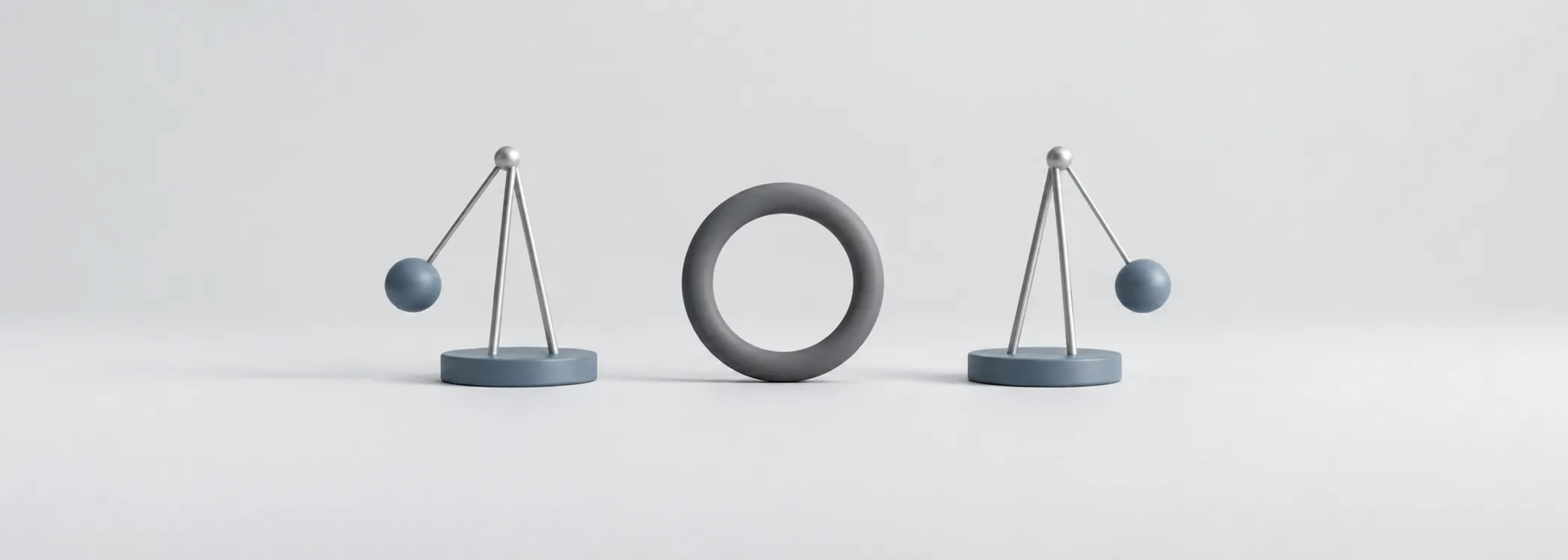 Two steel-blue pendulums beside a graphite linking ring, representing the relationship between investment returns.